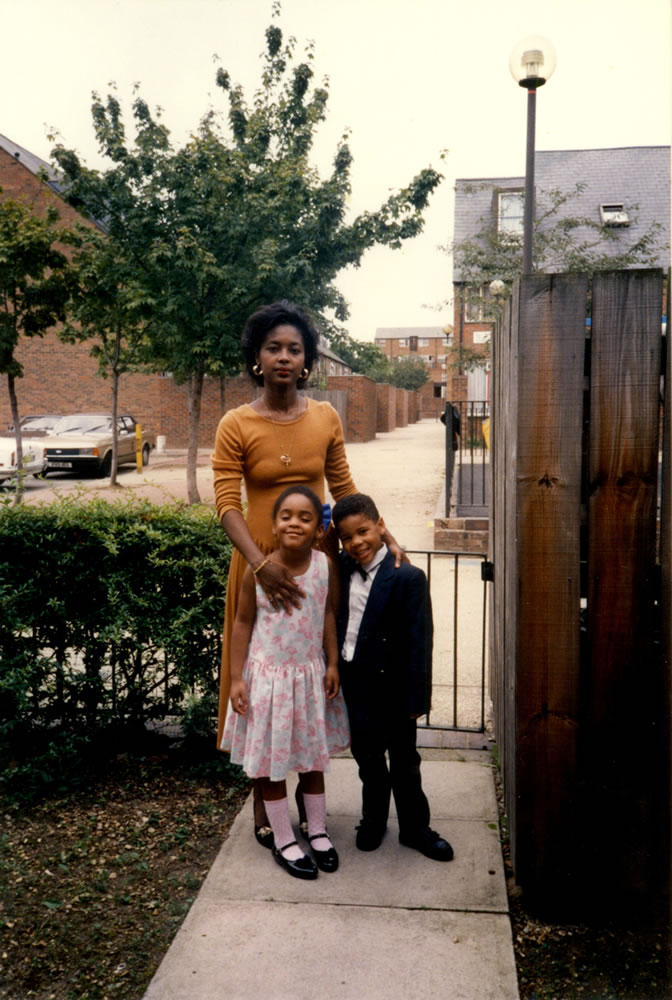 Reggie with his mother and sister