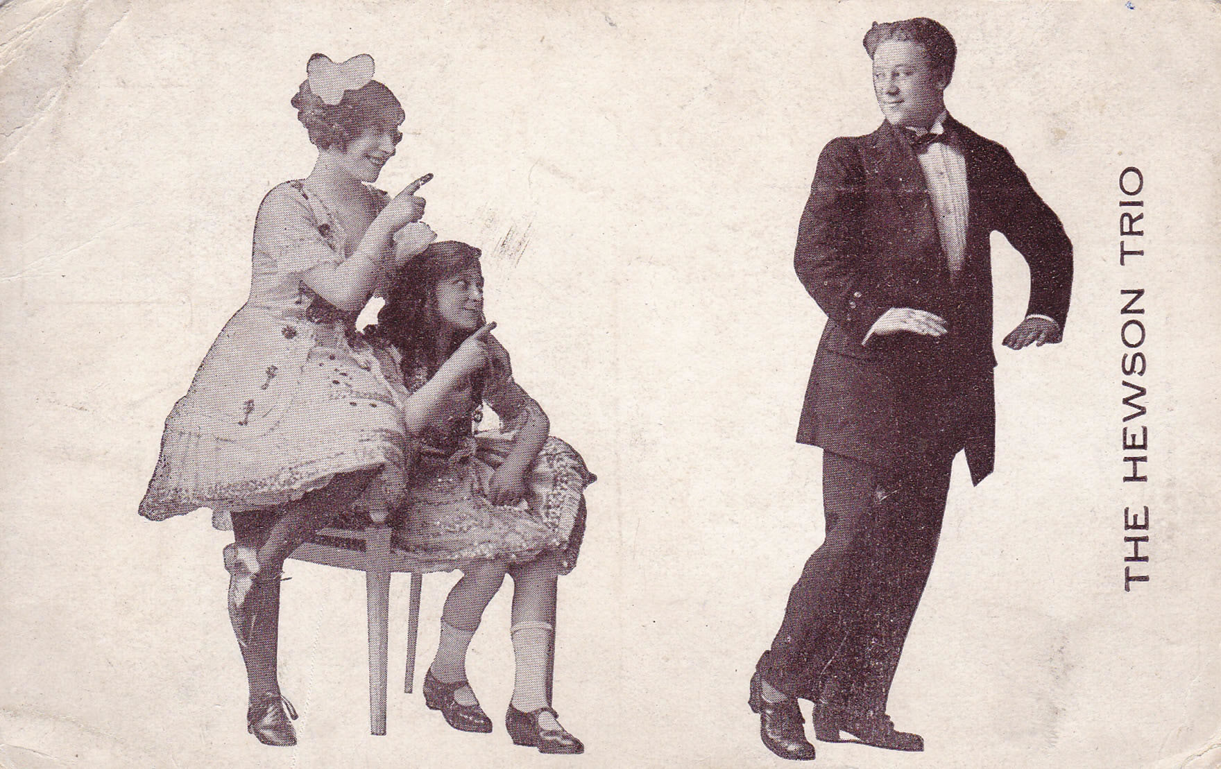 Postcard of The Hewson Trio - A Vaudeville theatre act made up of (L-R) Dolly (Sharon Osbourne's grandmother), Ira (Dolly's sister, sitting down) and Arthur James Shaw (Dolly's husband and Sharon Osbourne's grandfather). Image Credit: BBC/Wall to Wall Media Ltd/Gina Maszlin.