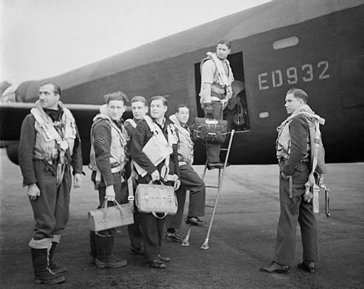 Wing Commander Guy Gibson (in the doorway) and his crew boarding their Lancaster bomber.Bellamy W (F/O), Royal Air Force official photographer, Public domain, via Wikimedia Commons