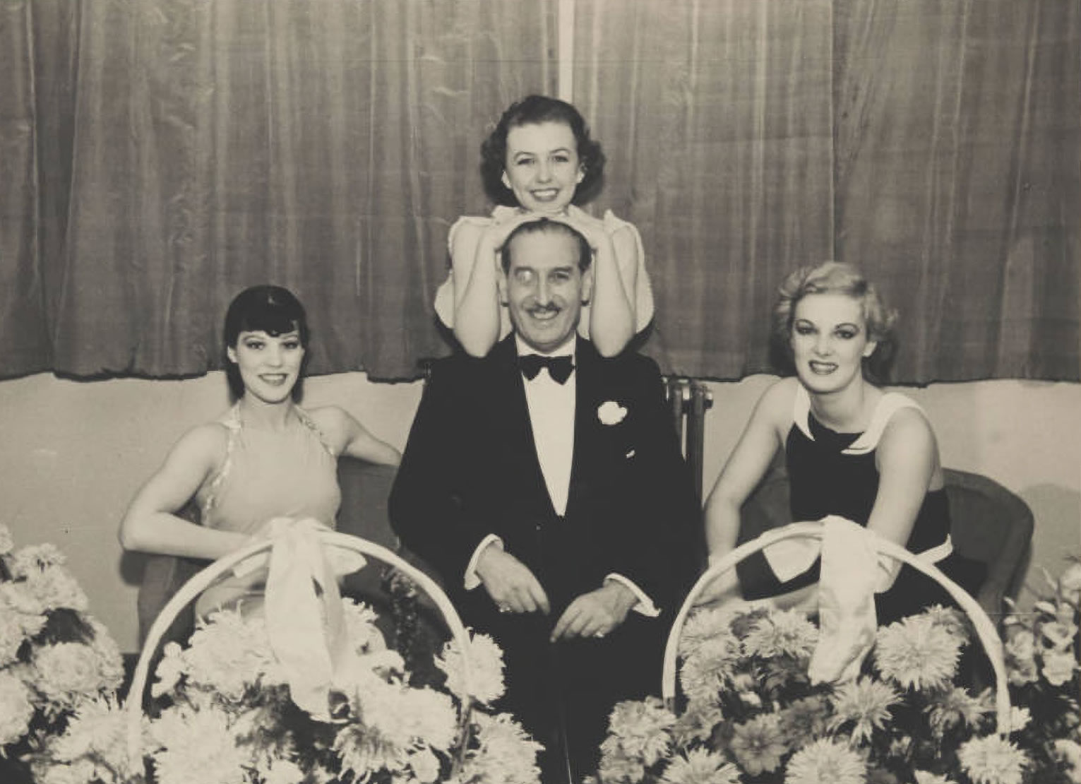 Sir Victor Sassoon with Three Women.  Image: DeGolyer Library, Southern Methodist University