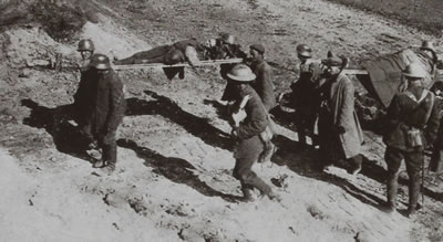 German Prisoners of War carrying wounded soldiers