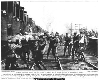British wounded being put on board a supply train under orders of Sergeant J Cooke (1914, Boue, DCM, Engine, Etreux, France, Picardie, RAMC, Sergeant, Train, Wounded, WW1)