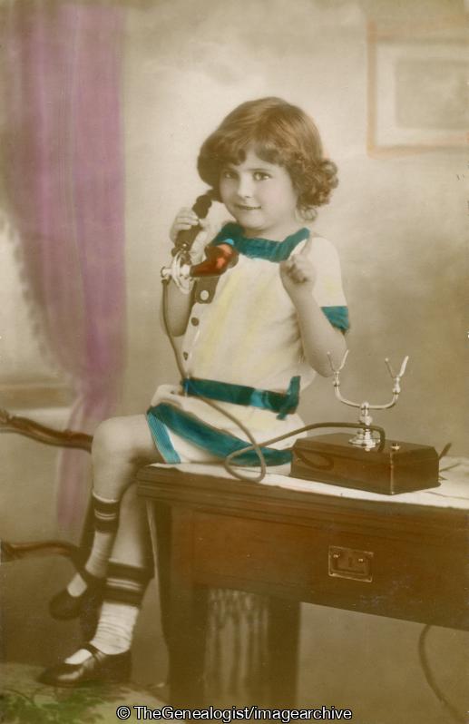 Child on desk with phone (chair, Child, desk, Telephone)