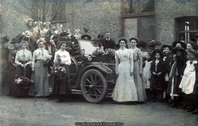 Group with flowers and Car (Car, flowers, Group Photograph, Vicar, Wedding)