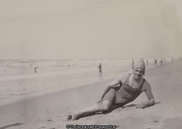 Male swimmer with cone cap on beach India (Beach, India, Swimming)